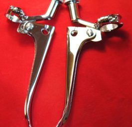 Triumph Handlebar levers Pre/unit 1" with sliding adjusters, large ball ends. C/W lever back bracket for horn/dipper switch. Made to original factory drawing. Pair.