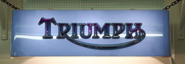 Triumph logo light